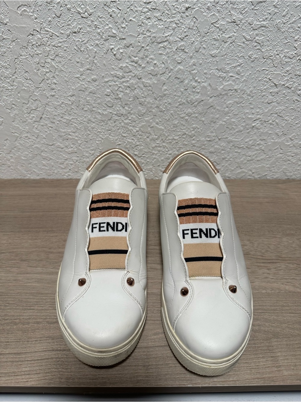 Fendi White Leather Slip-On Sneakers with Beige and Black Logo Panel